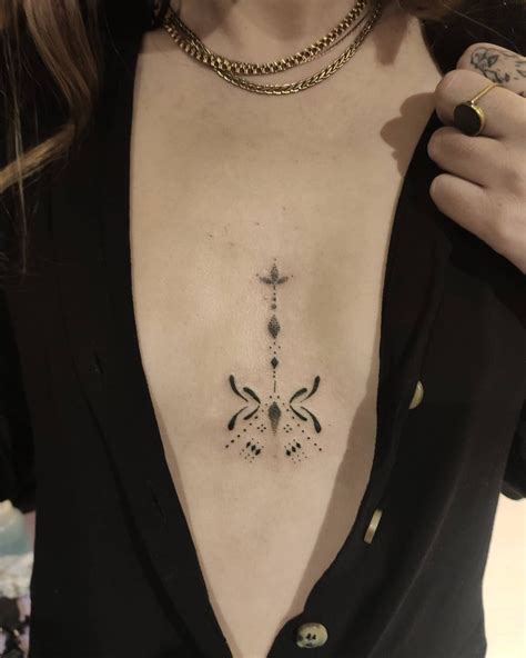 sternum tattoo between breast|Sternum Tattoo: 30 Design Ideas to Try